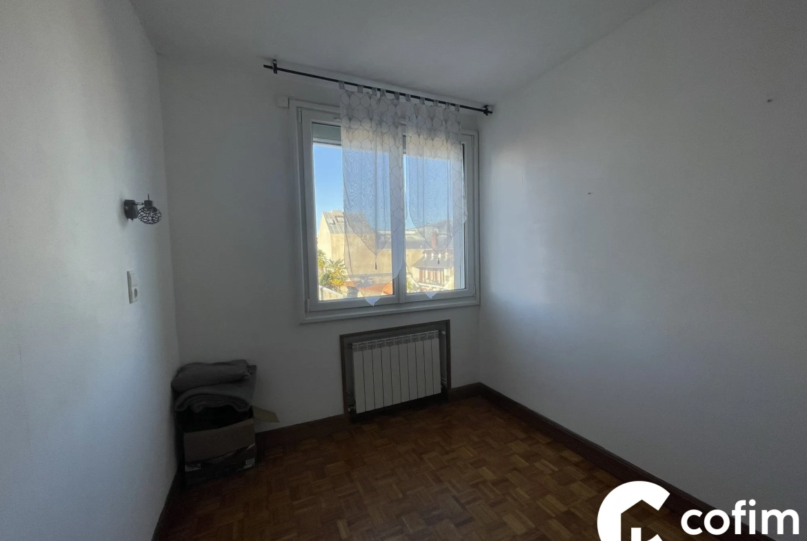 Appartement T3/T4 à vendre au cœur de Tarbes avec loggia, cave et garage sécurisé 