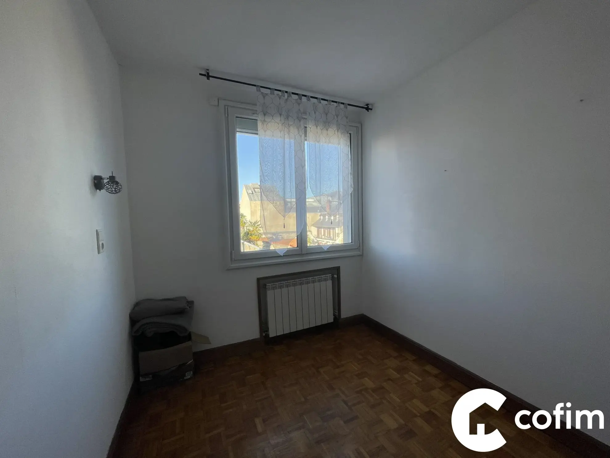 Appartement T3/T4 à vendre au cœur de Tarbes avec loggia, cave et garage sécurisé 