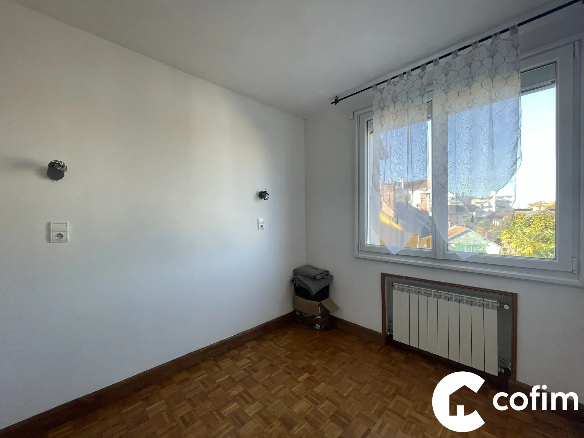 Appartement T3/T4 à vendre au cœur de Tarbes avec loggia, cave et garage sécurisé 