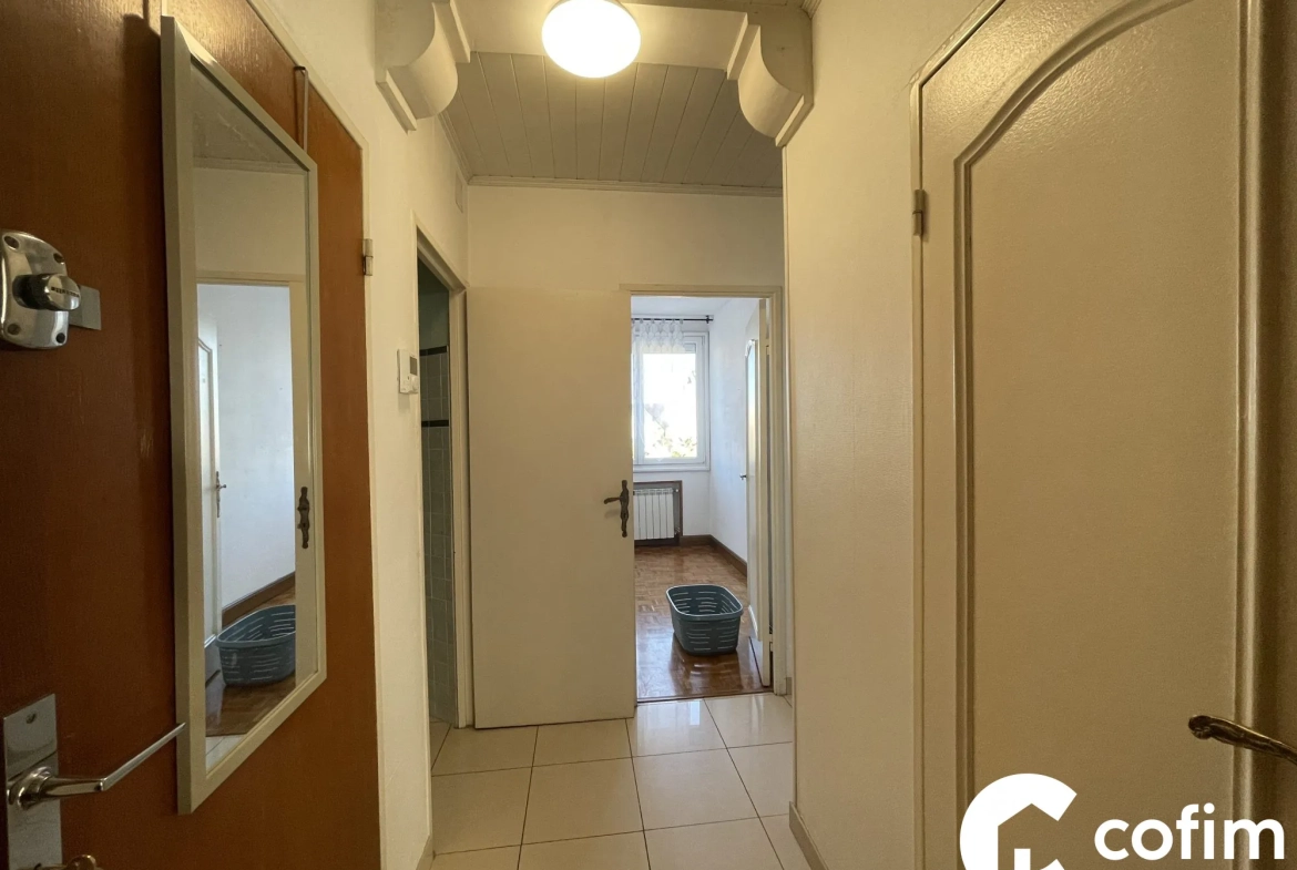 Appartement T3/T4 à vendre au cœur de Tarbes avec loggia, cave et garage sécurisé 