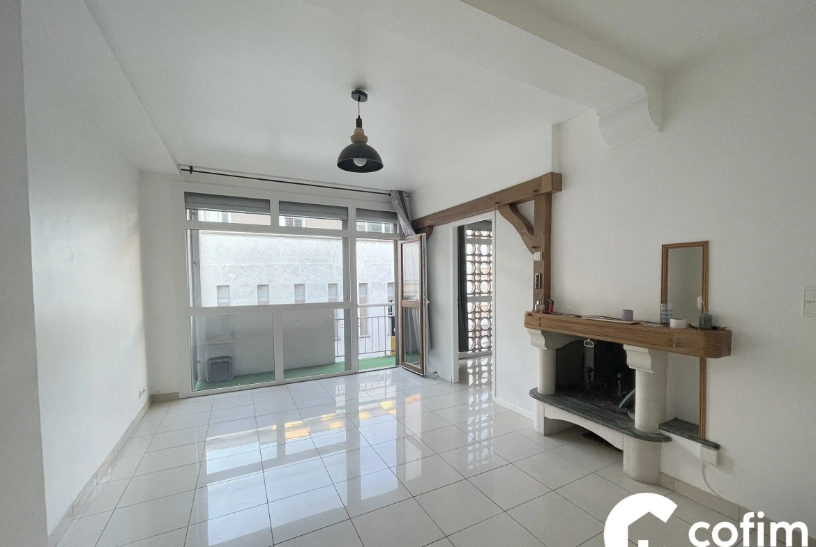 Appartement T3/T4 à vendre au cœur de Tarbes avec loggia, cave et garage sécurisé 