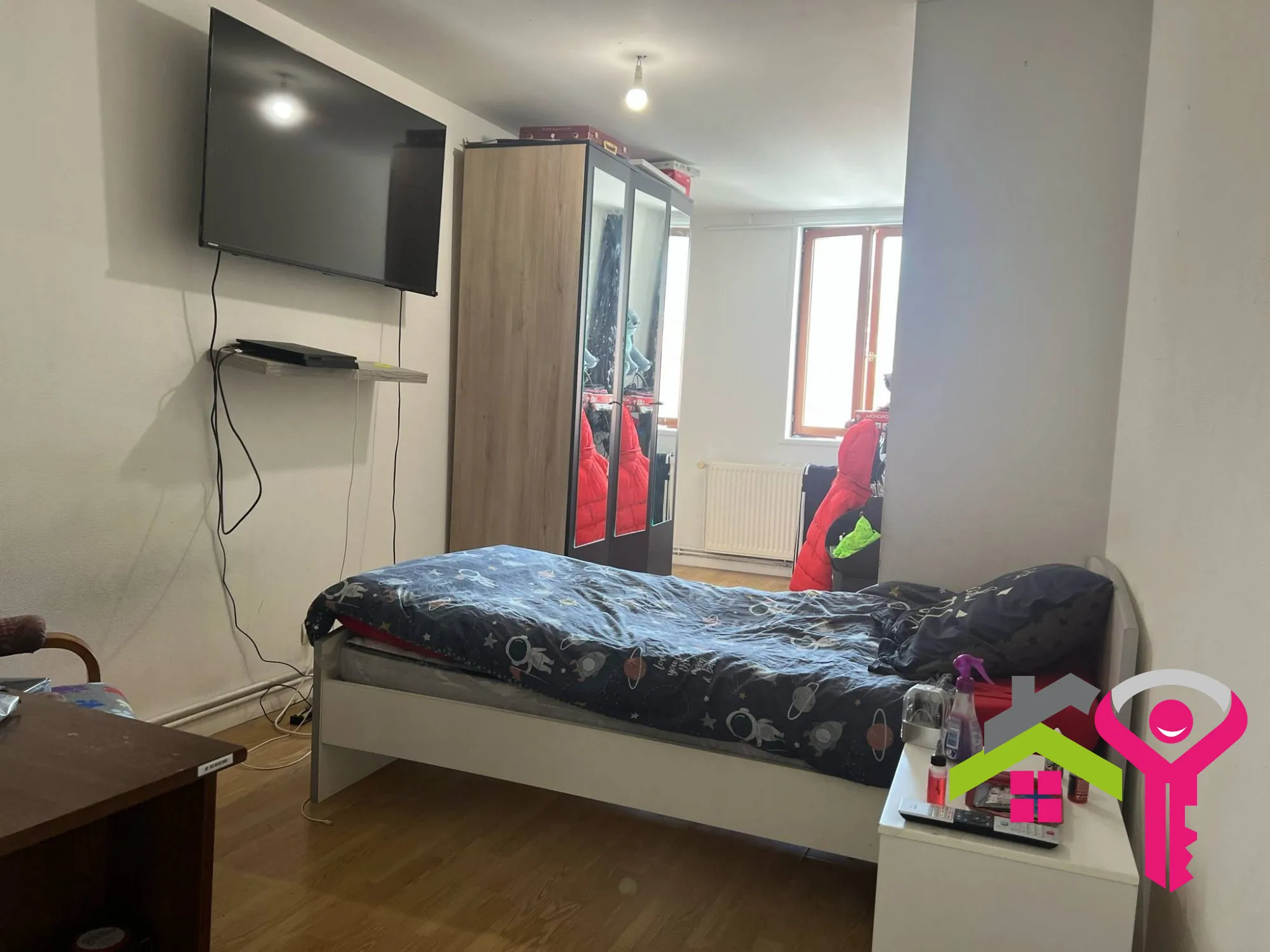 Immeuble de rapport à Douchy-les-Mines avec maison et local commercial à vendre 