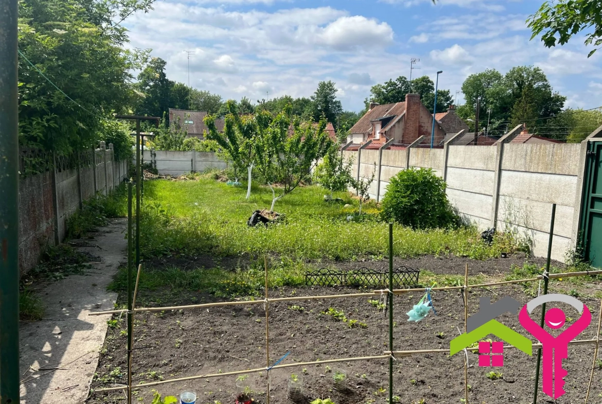 Immeuble de rapport à Douchy-les-Mines avec maison et local commercial à vendre 
