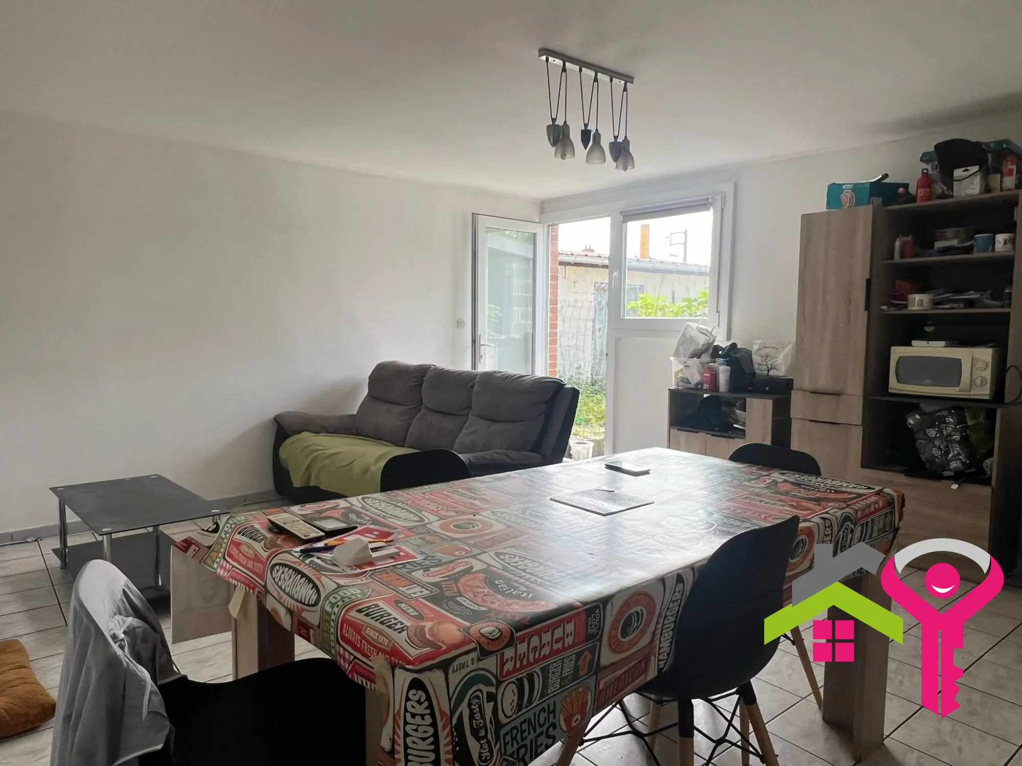 Immeuble de rapport à Douchy-les-Mines avec maison et local commercial à vendre 