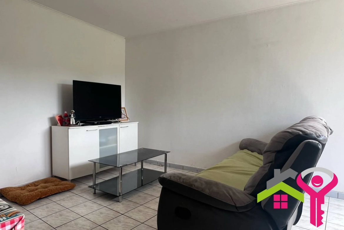 Immeuble de rapport à Douchy-les-Mines avec maison et local commercial à vendre 