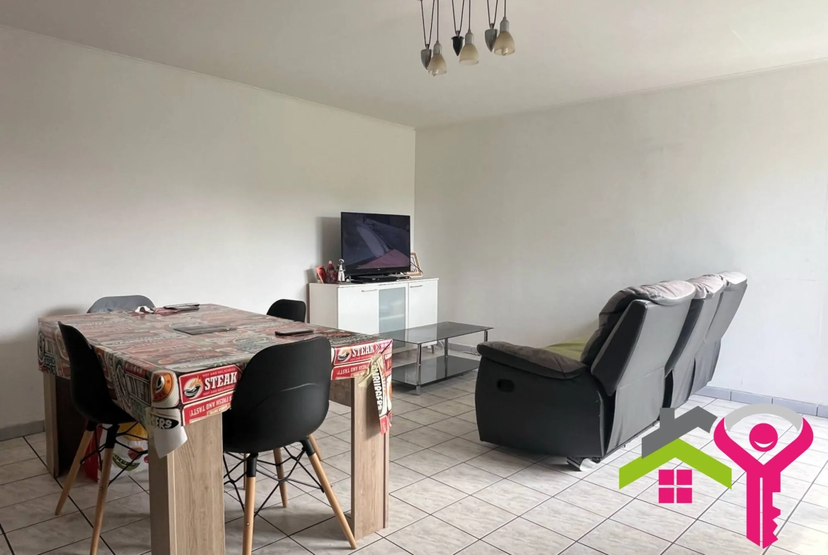 Immeuble de rapport à Douchy-les-Mines avec maison et local commercial à vendre 