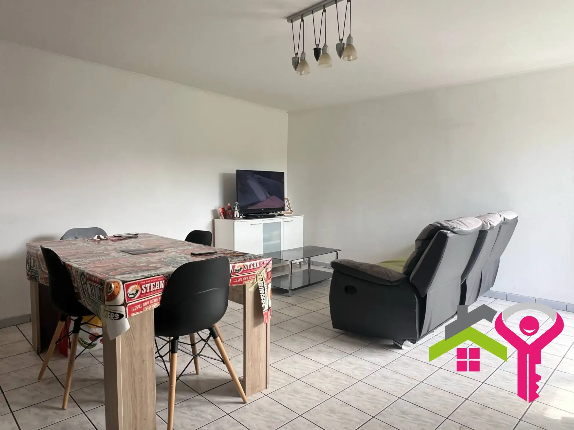Immeuble de rapport à Douchy-les-Mines avec maison et local commercial à vendre 