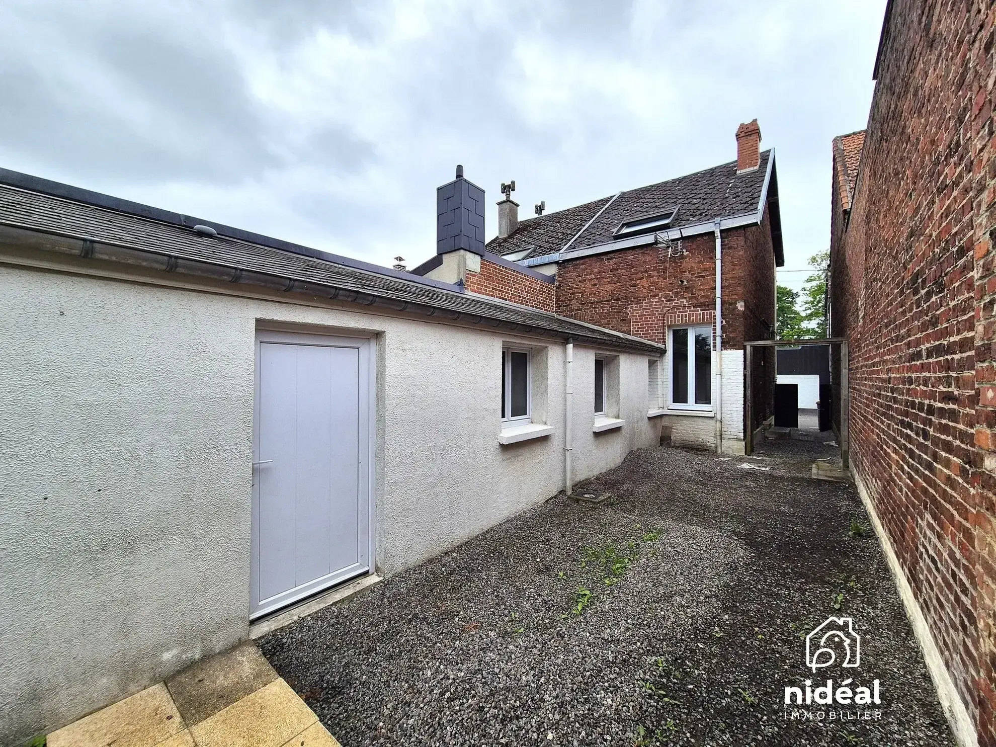 Maison semi-individuelle à vendre à Aulnoye-Aymeries de 62 m² avec terrain clôturé 