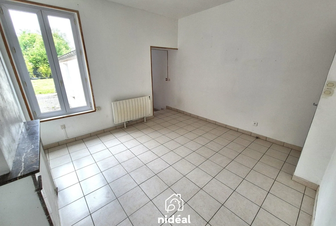 Maison semi-individuelle à vendre à Aulnoye-Aymeries de 62 m² avec terrain clôturé 