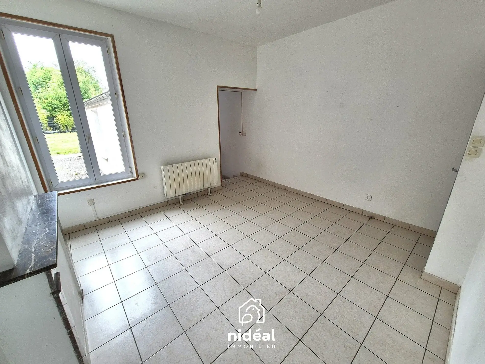 Maison semi-individuelle à vendre à Aulnoye-Aymeries de 62 m² avec terrain clôturé 
