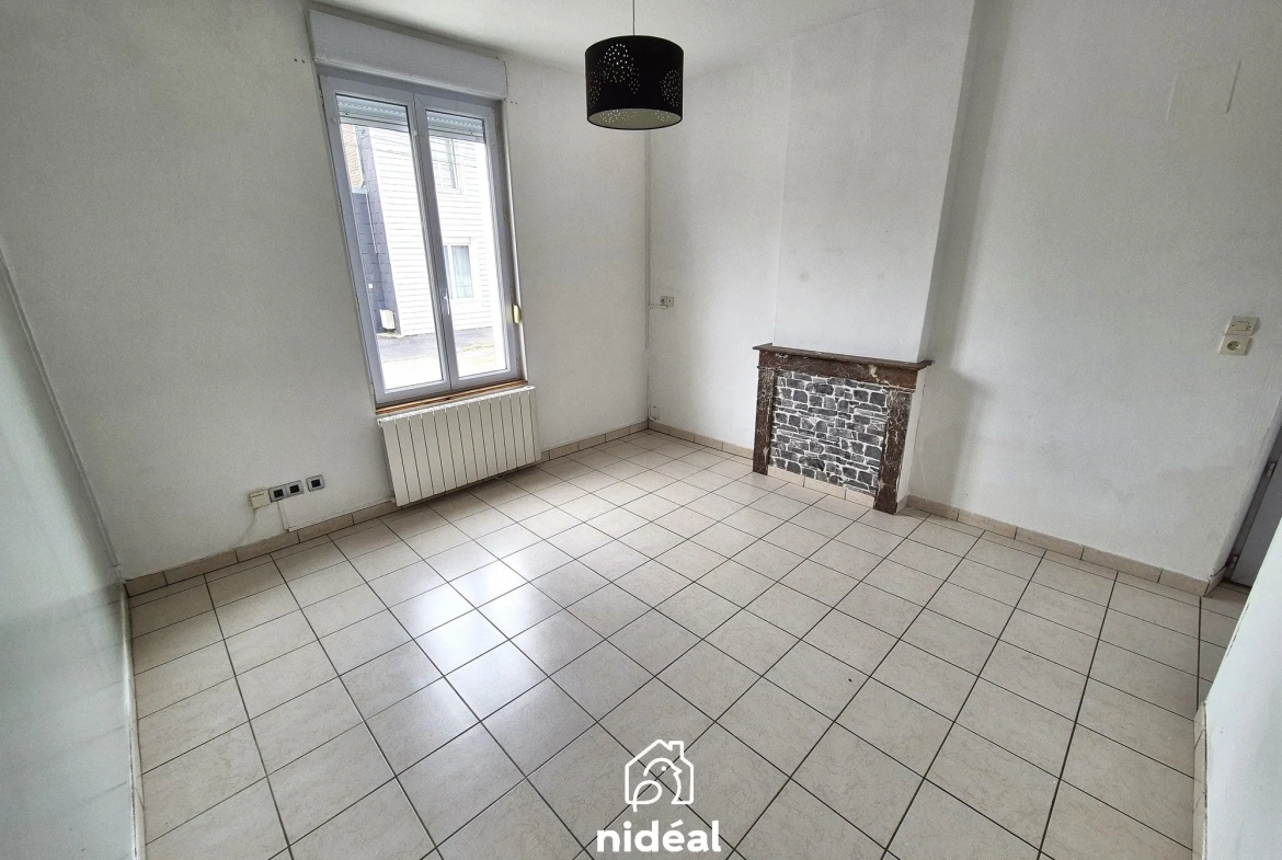 Maison semi-individuelle à vendre à Aulnoye-Aymeries de 62 m² avec terrain clôturé 