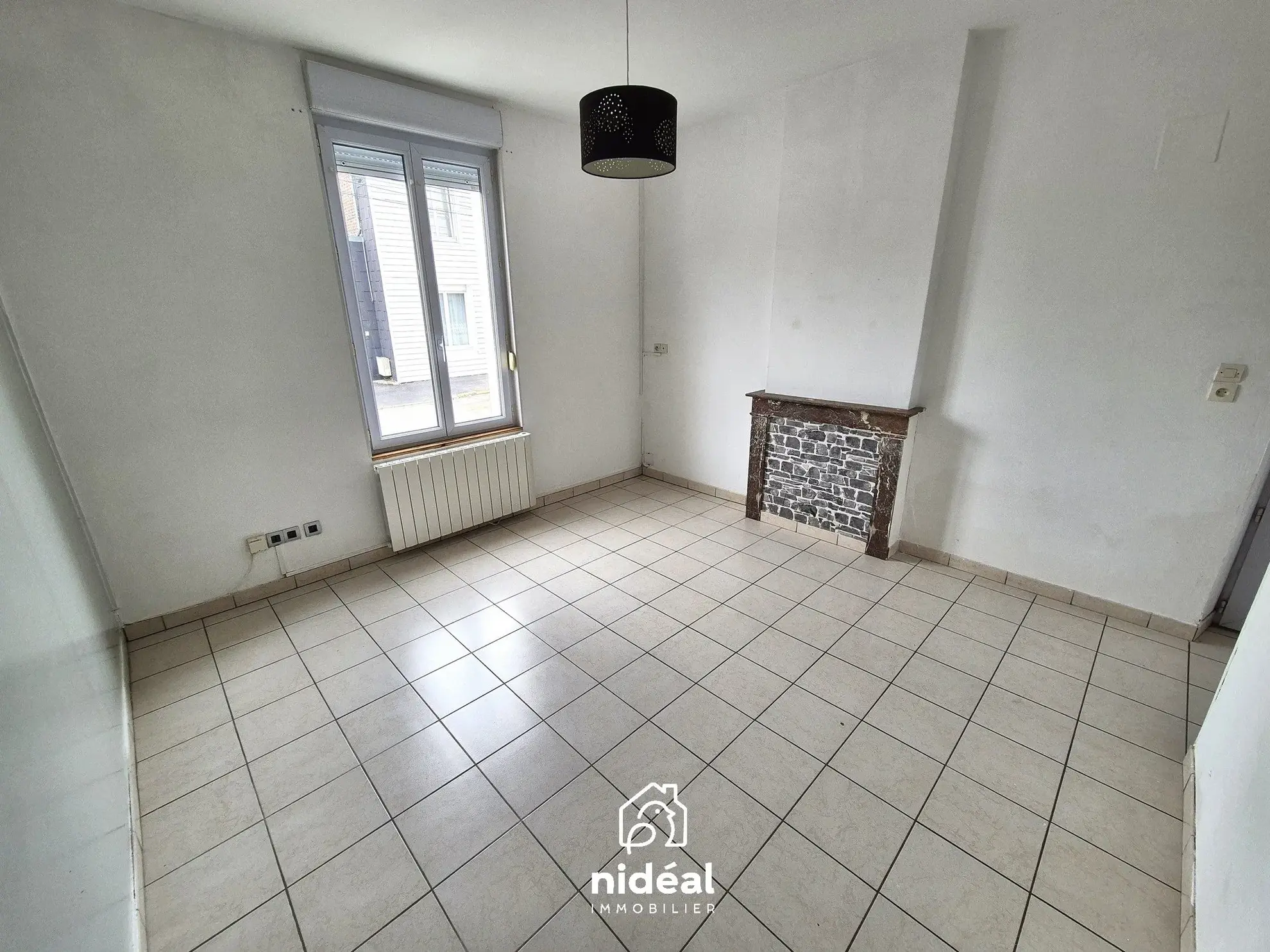 Maison semi-individuelle à vendre à Aulnoye-Aymeries de 62 m² avec terrain clôturé 