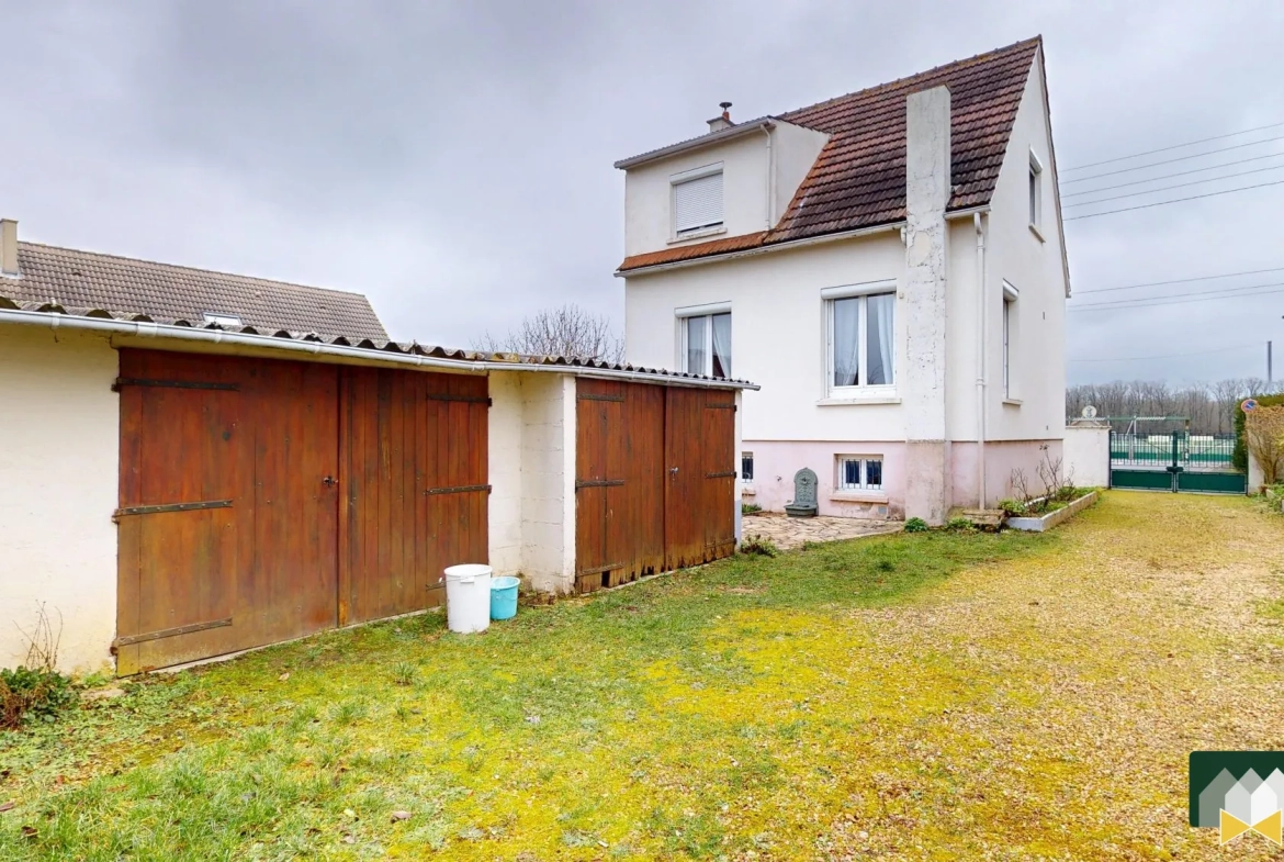 Maison familiale avec sous-sol et garages à Champhol, parfait premier achat 