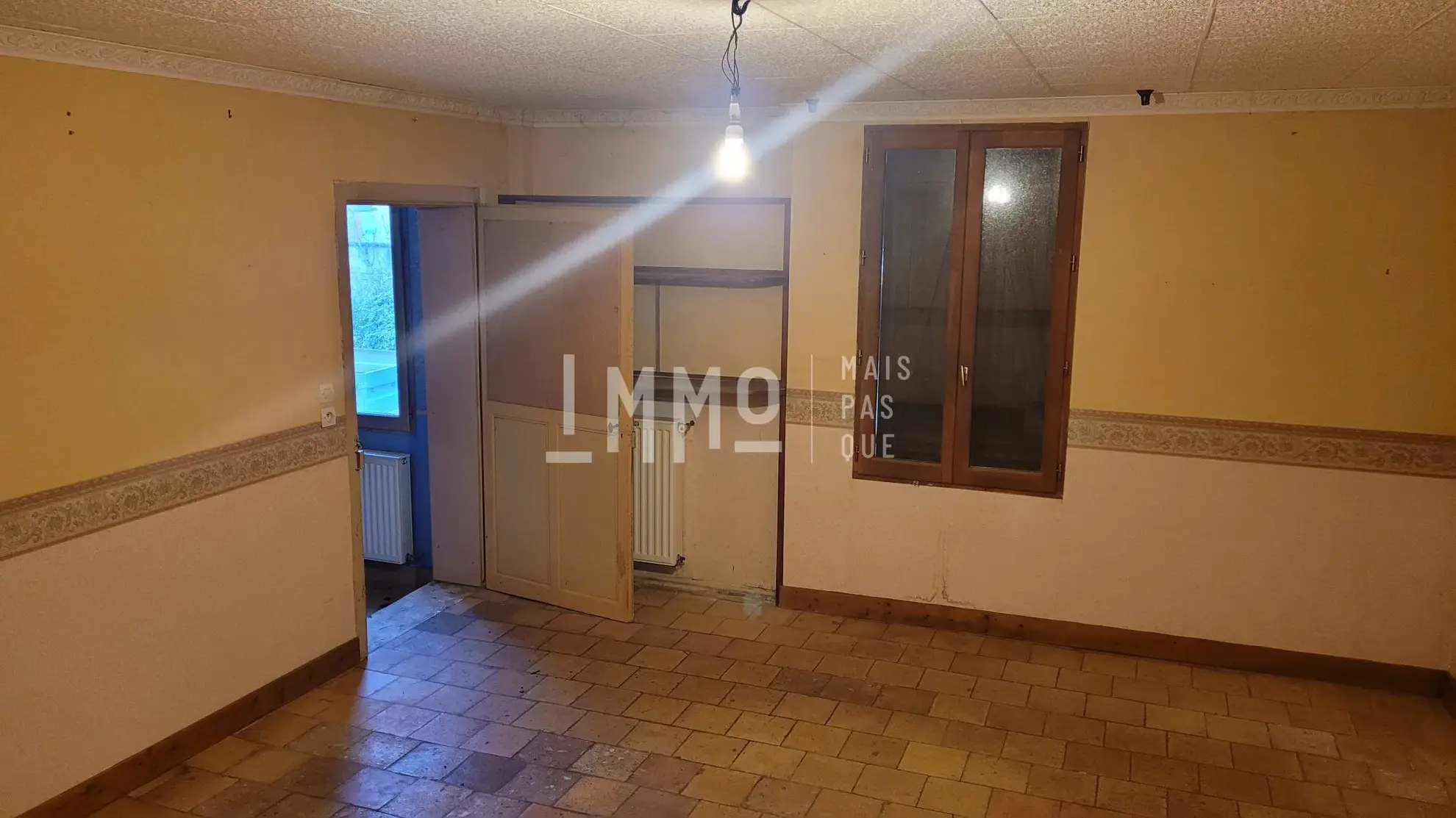 Maison mitoyenne à rénover avec jardin à Montoire-sur-le-Loir 