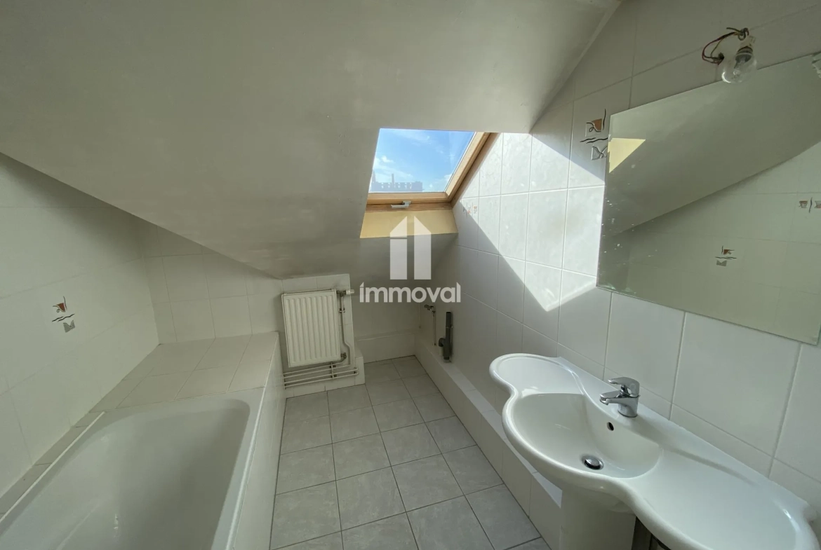 Appartement 3 pièces de 71 m² à vendre à Schiltigheim avec cave et grenier 