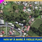 Terrain à vendre à Salazie avec maisons à rénover et potentiel de construction