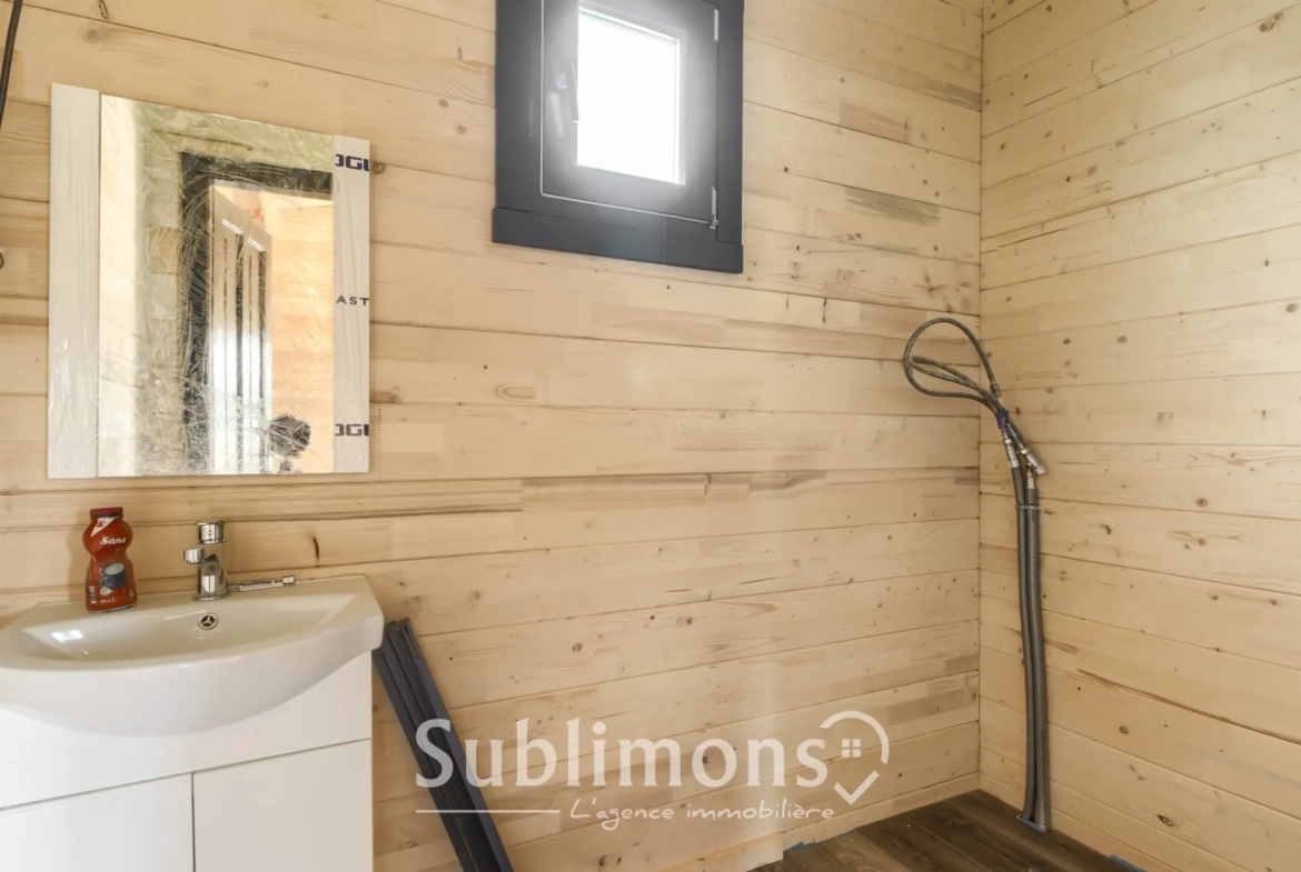 Chalet en bois de 46 m² avec terrasse dans un parc résidentiel à Sulniac 