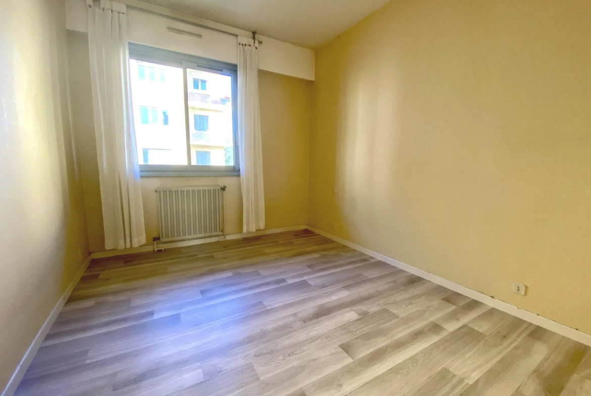 Appartement traversant 60 m² avec garage à Romans-sur-Isère 