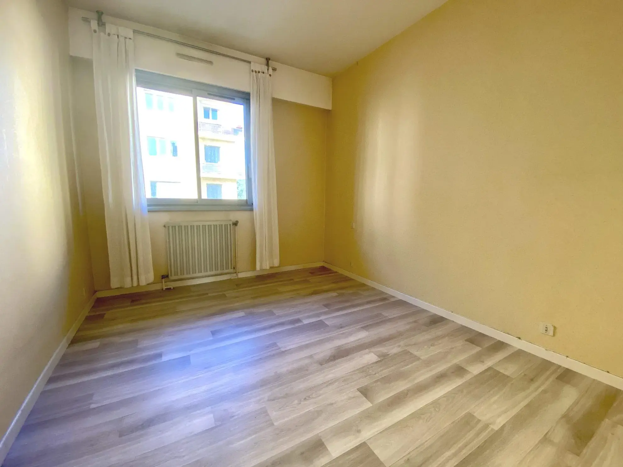 Appartement traversant 60 m² avec garage à Romans-sur-Isère 