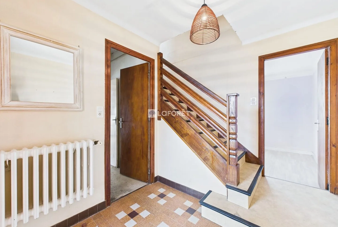 Maison de 87 m² à Quimper, quartier calme avec garage et combles aménagés 