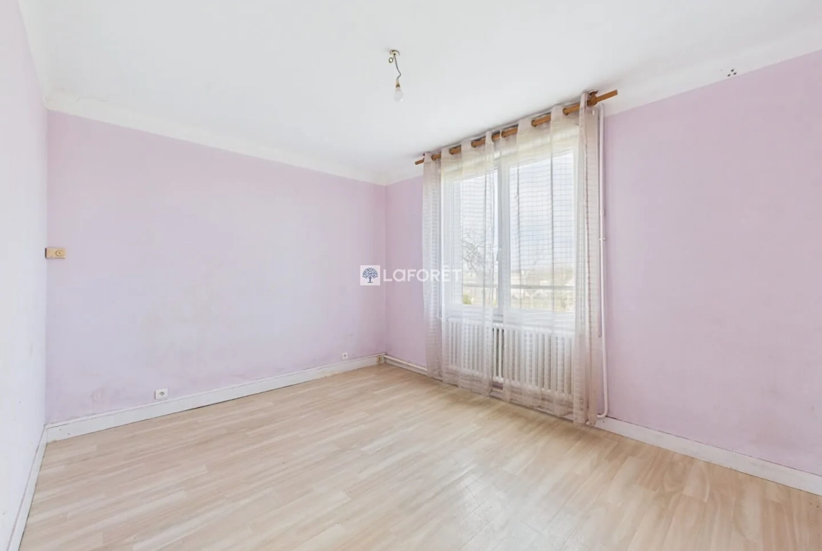 Maison de 87 m² à Quimper, quartier calme avec garage et combles aménagés 