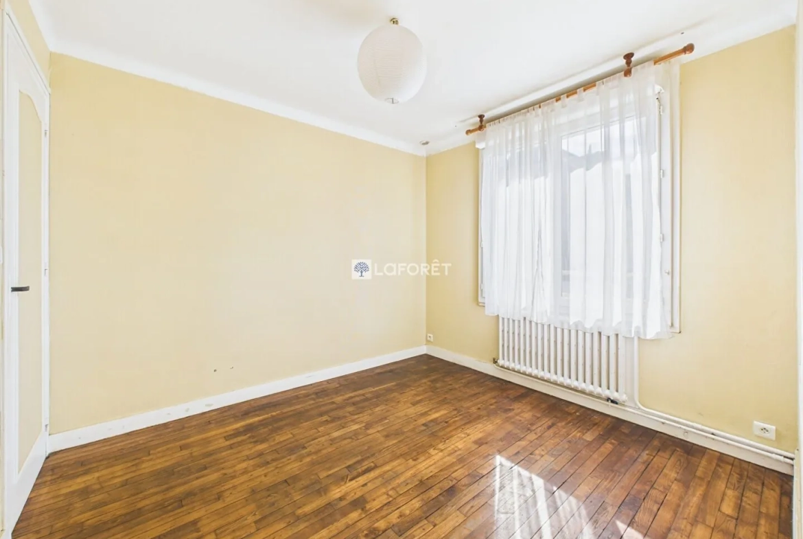 Maison de 87 m² à Quimper, quartier calme avec garage et combles aménagés 