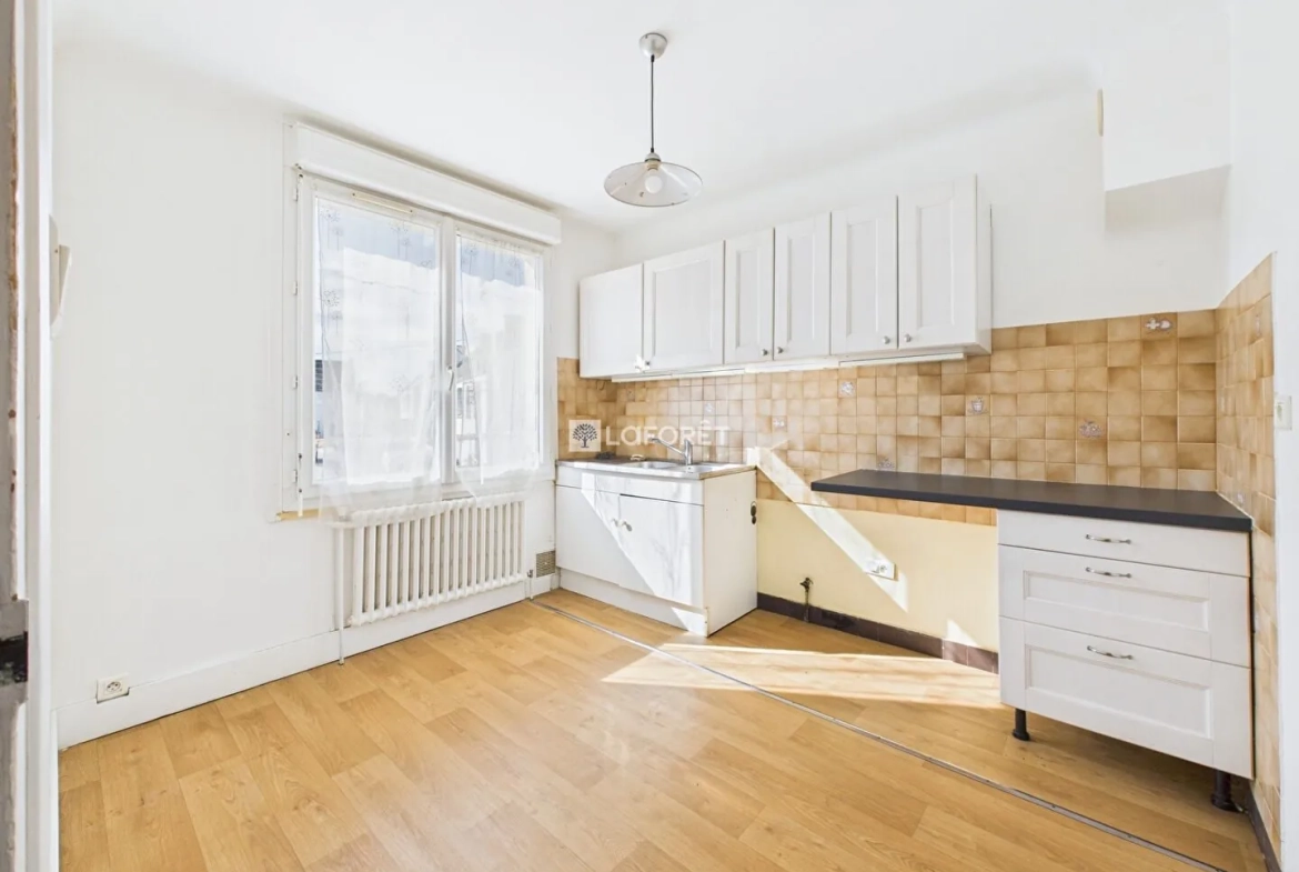 Maison de 87 m² à Quimper, quartier calme avec garage et combles aménagés 