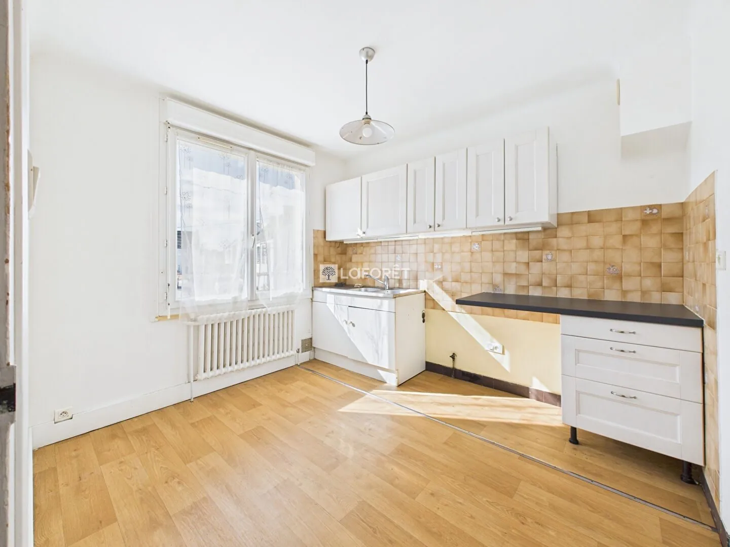 Maison de 87 m² à Quimper, quartier calme avec garage et combles aménagés 