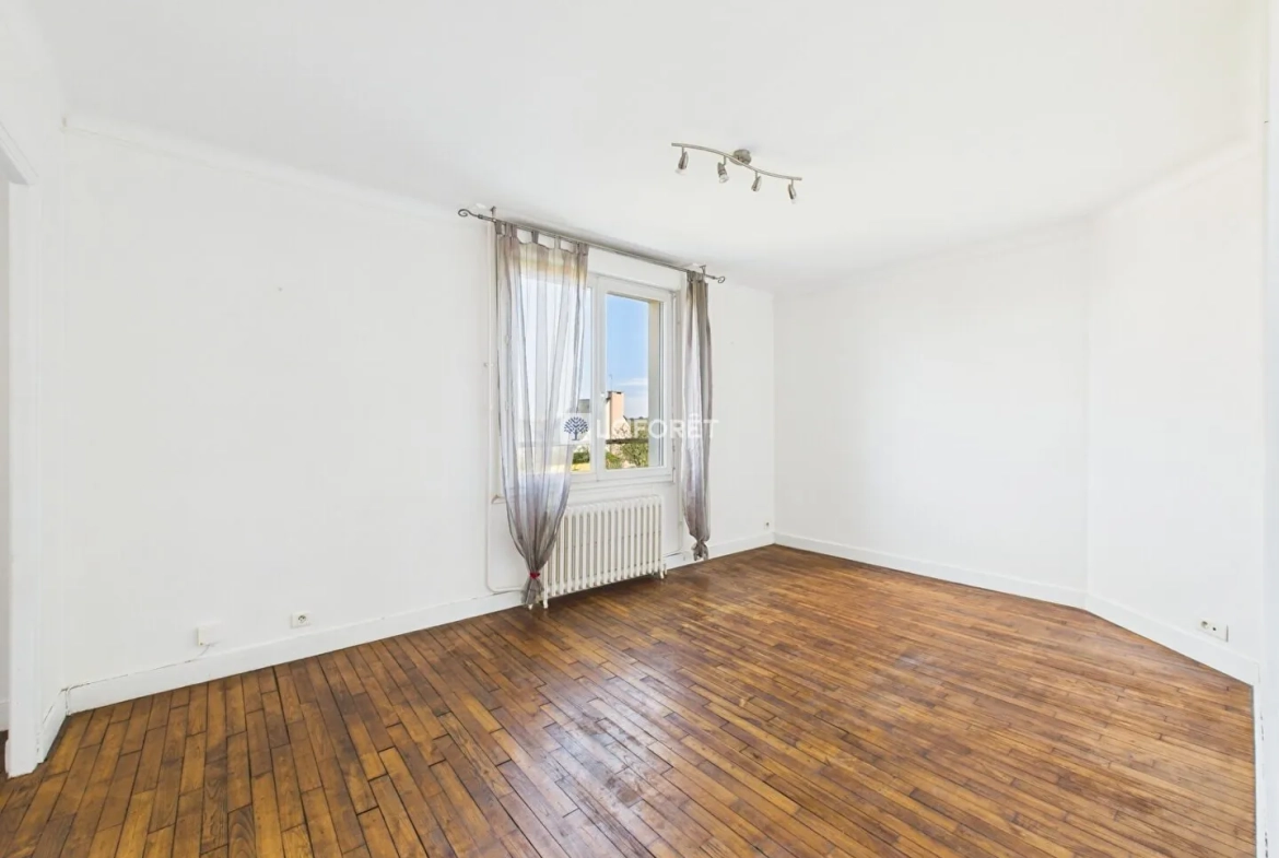 Maison de 87 m² à Quimper, quartier calme avec garage et combles aménagés 