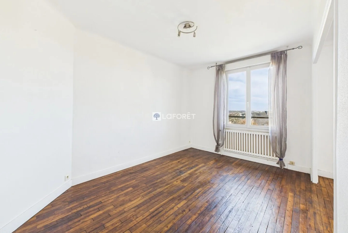 Maison de 87 m² à Quimper, quartier calme avec garage et combles aménagés 
