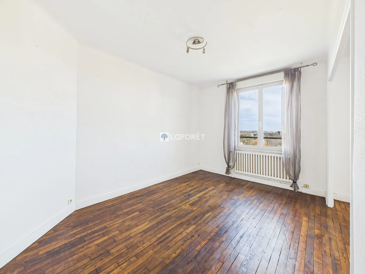 Maison de 87 m² à Quimper, quartier calme avec garage et combles aménagés 