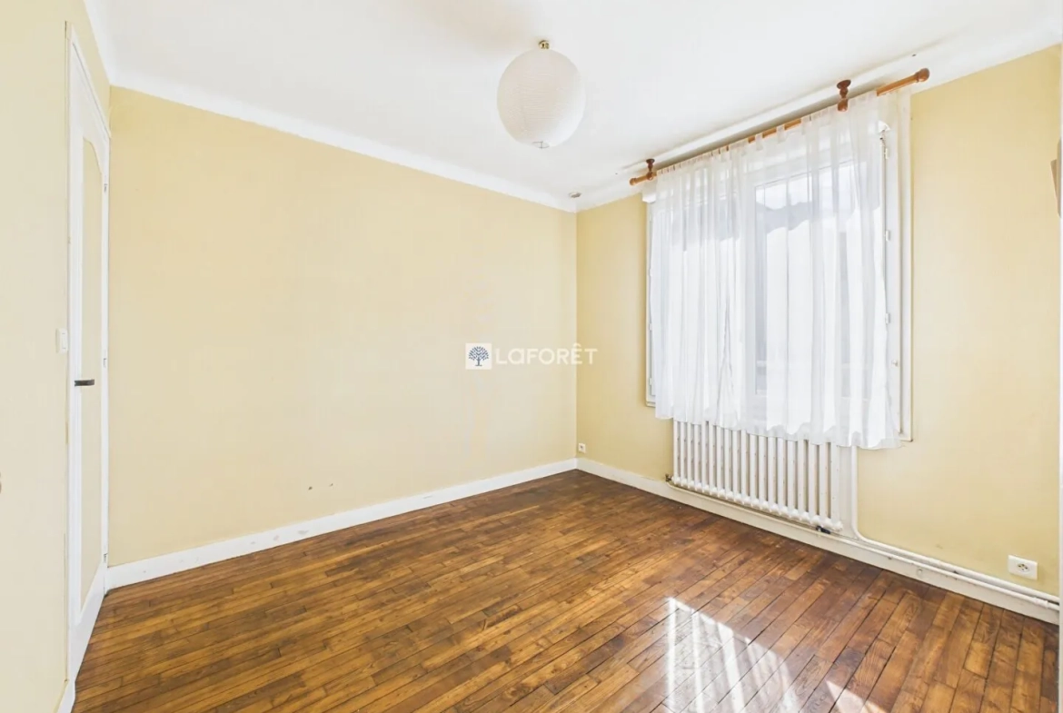 Maison de 87 m² à Quimper, quartier calme avec garage et combles aménagés 