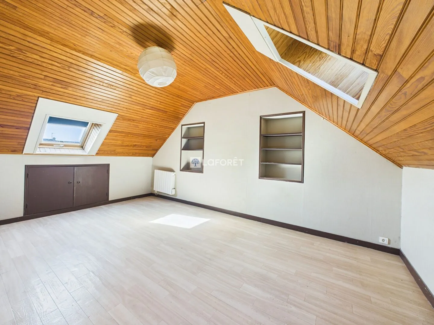 Maison de 87 m² à Quimper, quartier calme avec garage et combles aménagés 