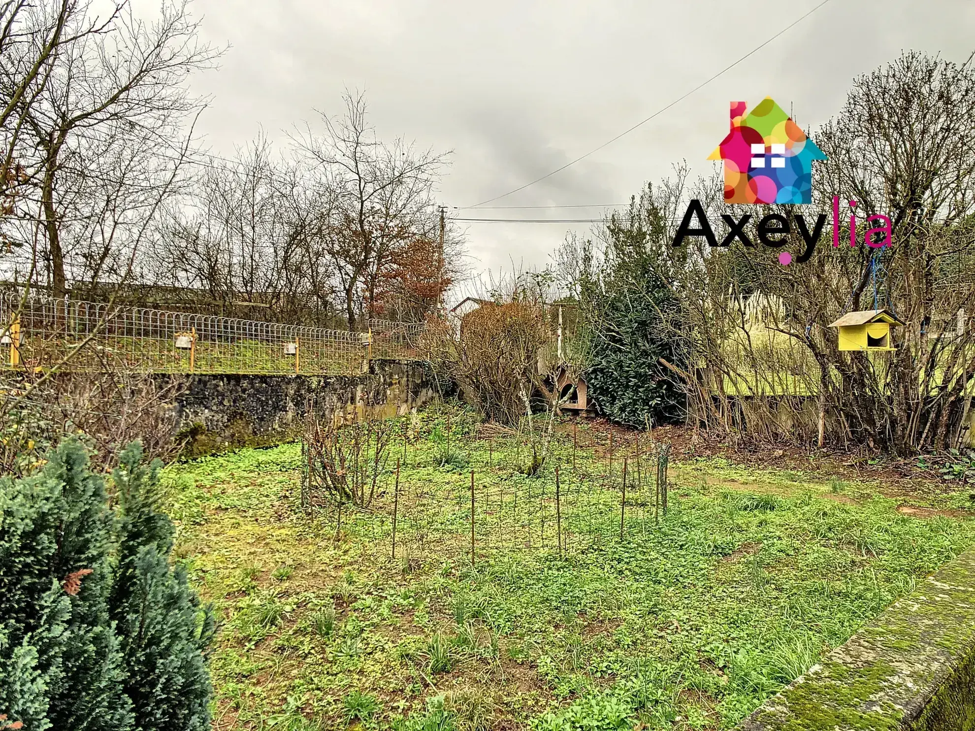 À vendre ensemble immobilier à Chauffailles avec maisons et terrains à rénover 