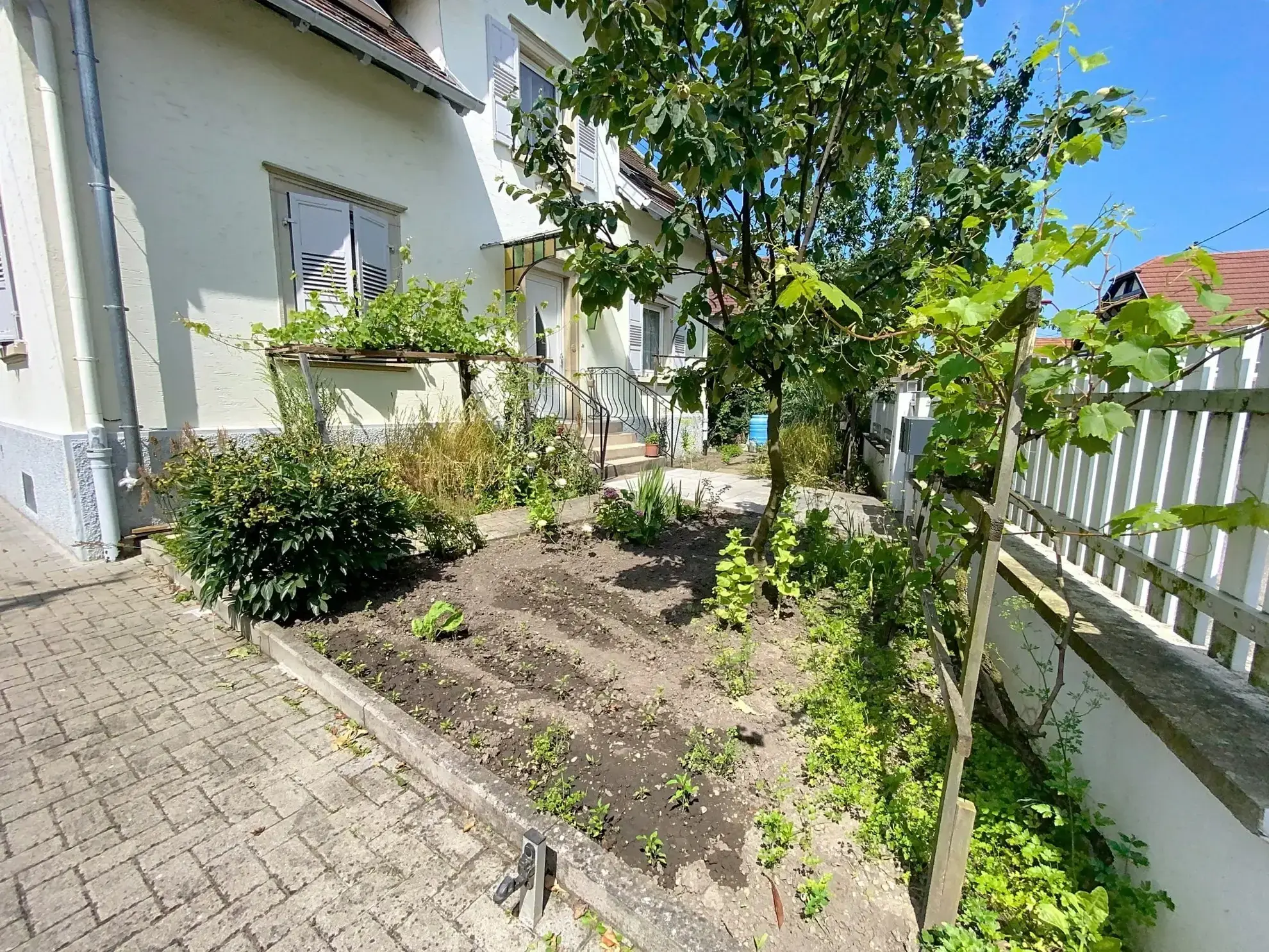 Appartement F3 à Plobsheim avec jardin, garage et grenier - 72,52 m² 