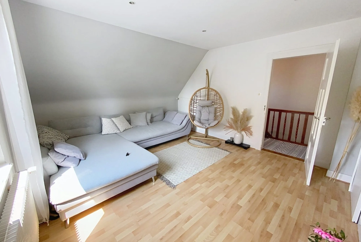 Appartement F3 à Plobsheim avec jardin, garage et grenier - 72,52 m² 