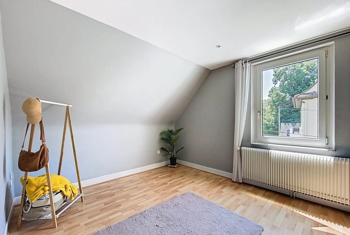 Appartement F3 à Plobsheim avec jardin, garage et grenier - 72,52 m² 