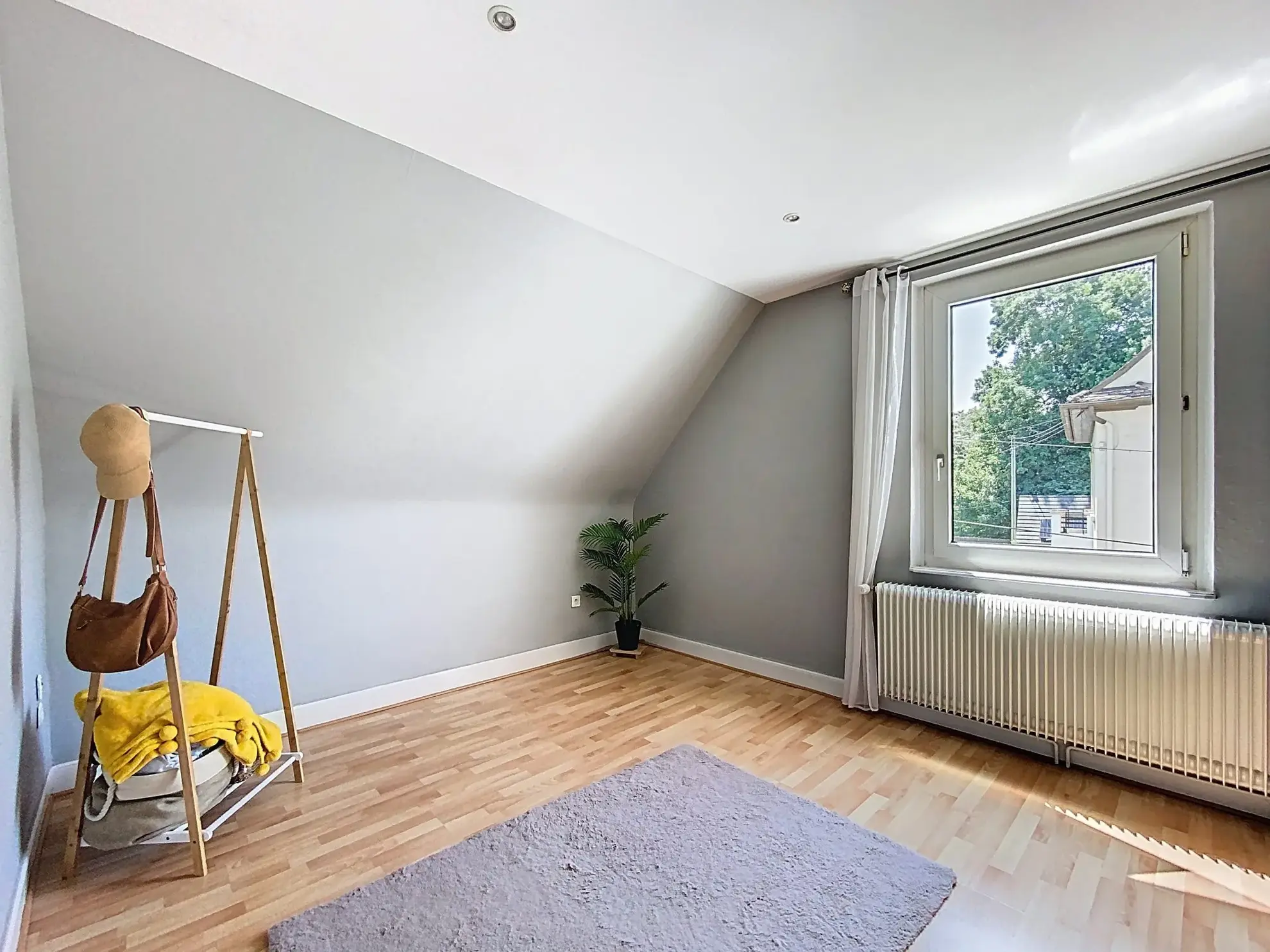Appartement F3 à Plobsheim avec jardin, garage et grenier - 72,52 m² 