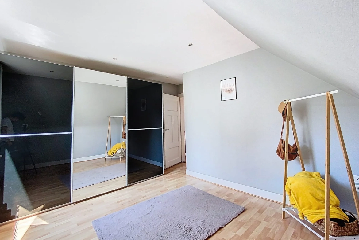 Appartement F3 à Plobsheim avec jardin, garage et grenier - 72,52 m² 