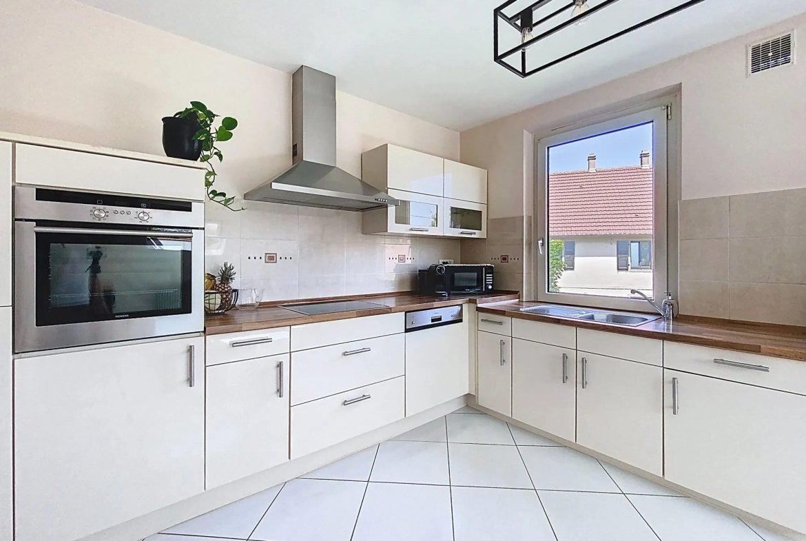 Appartement F3 à Plobsheim avec jardin, garage et grenier - 72,52 m² 