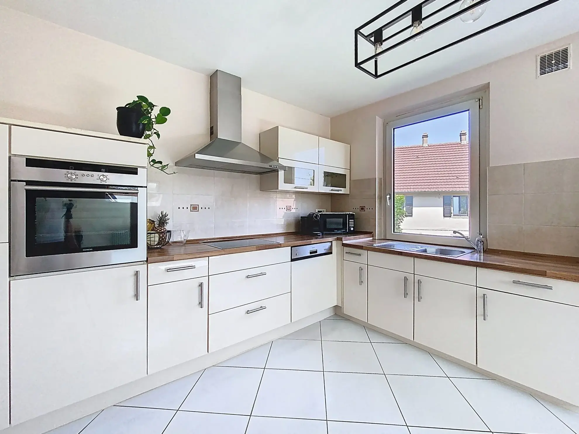 Appartement F3 à Plobsheim avec jardin, garage et grenier - 72,52 m² 