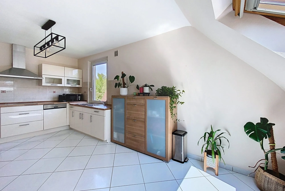Appartement F3 à Plobsheim avec jardin, garage et grenier - 72,52 m² 
