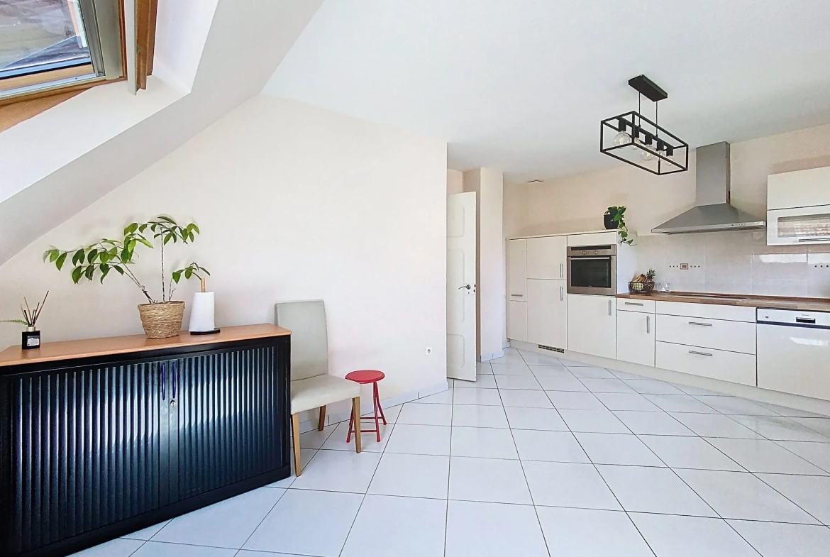 Appartement F3 à Plobsheim avec jardin, garage et grenier - 72,52 m² 