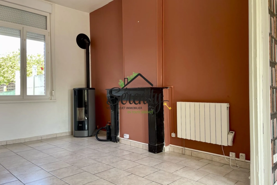 Maison mitoyenne à vendre à Hasnon – 85 m², proche toutes commodités 