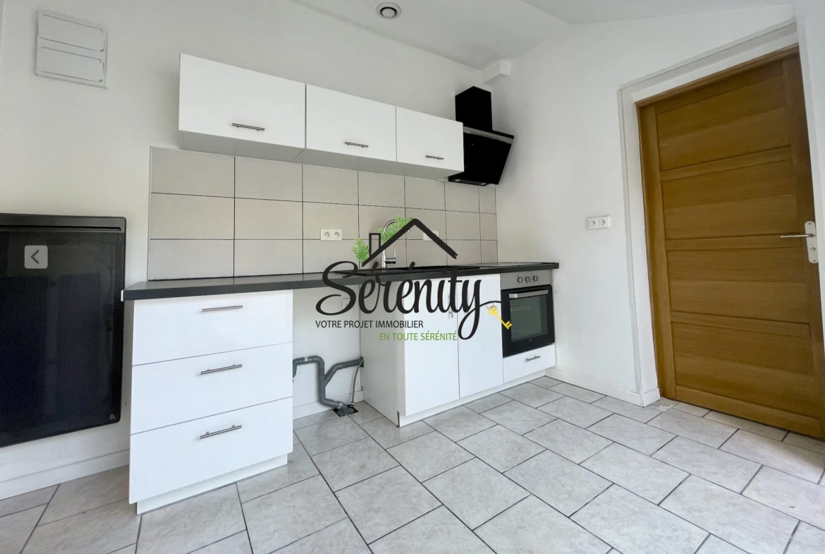 Maison mitoyenne à vendre à Hasnon – 85 m², proche toutes commodités 