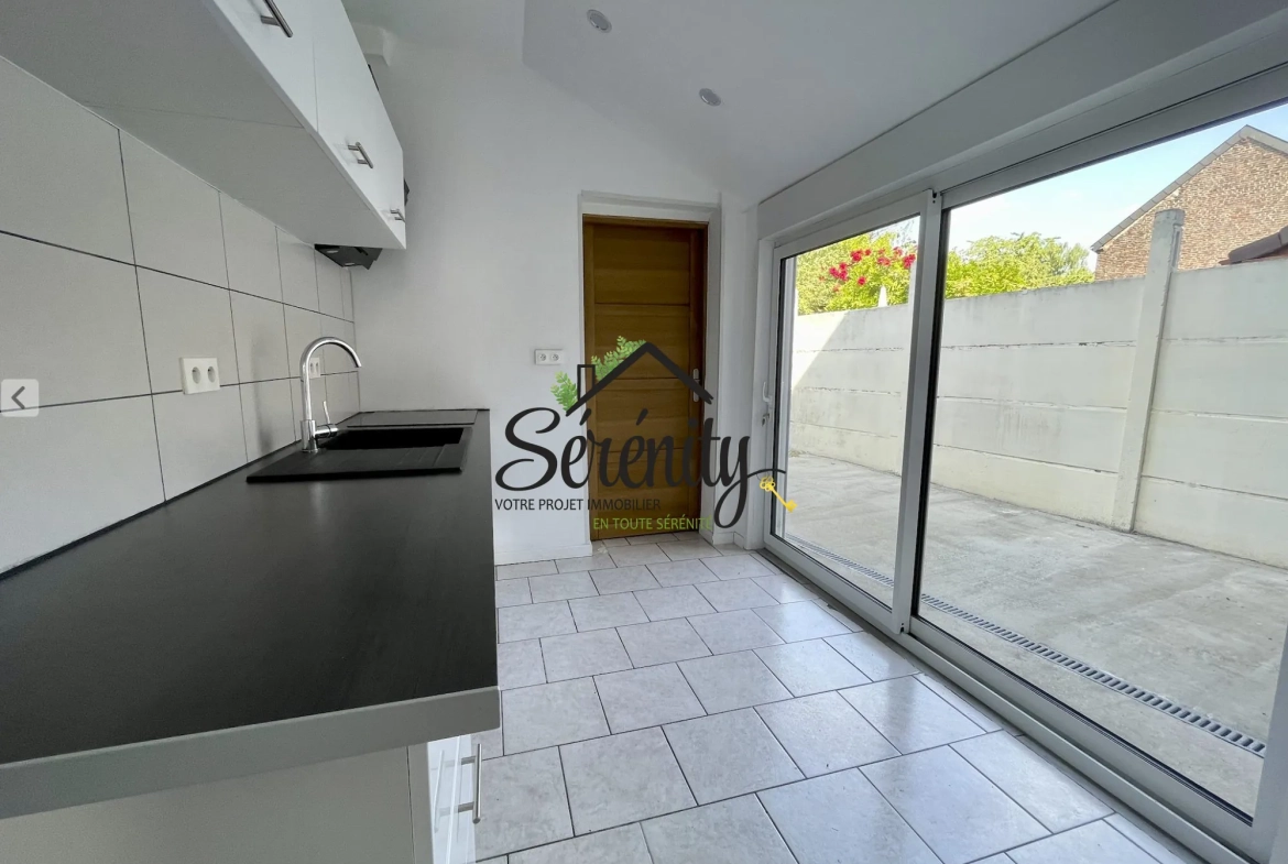 Maison mitoyenne à vendre à Hasnon – 85 m², proche toutes commodités 