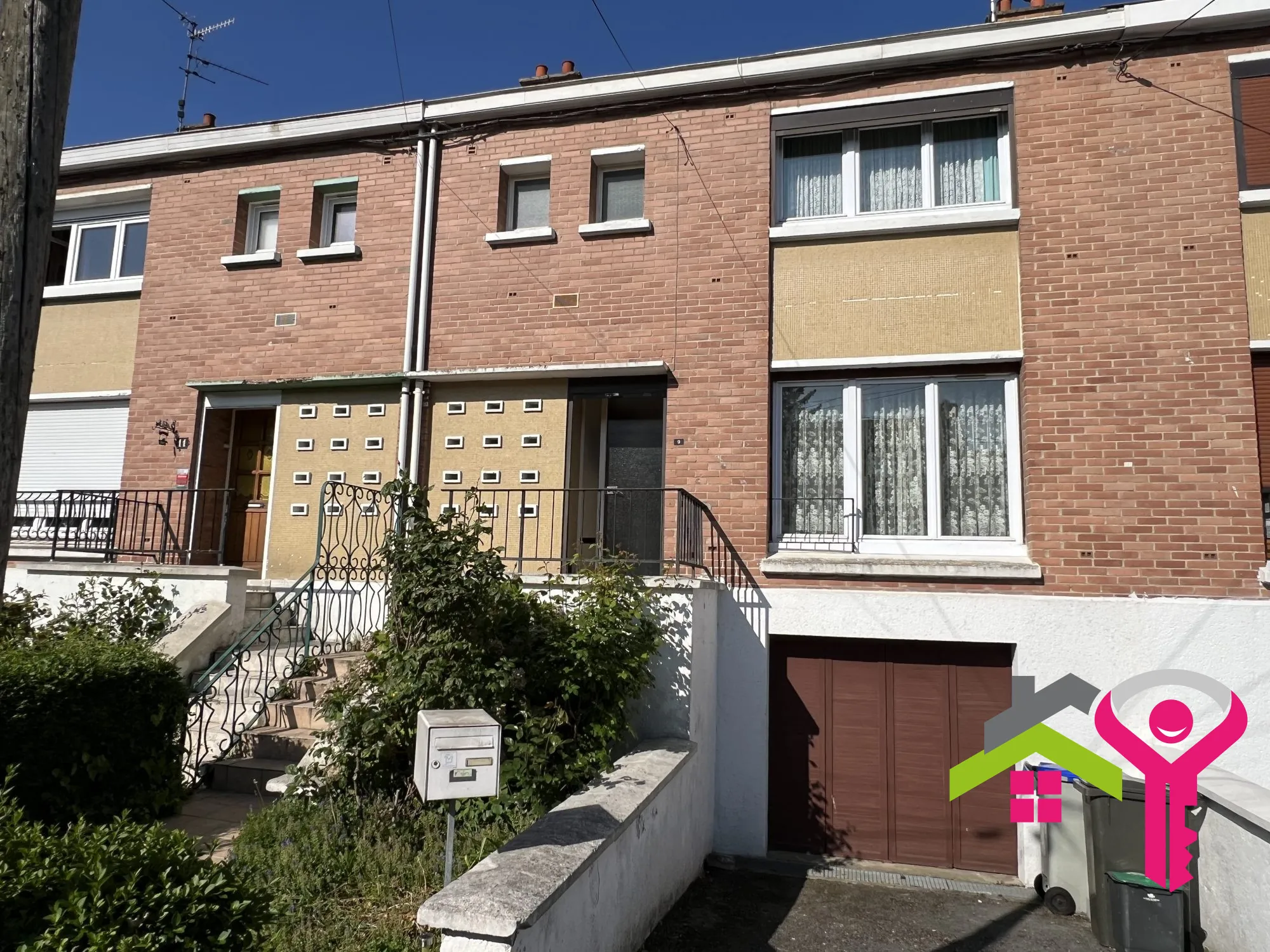 Maison lumineuse avec garage, jardin et terrasse à Denain 