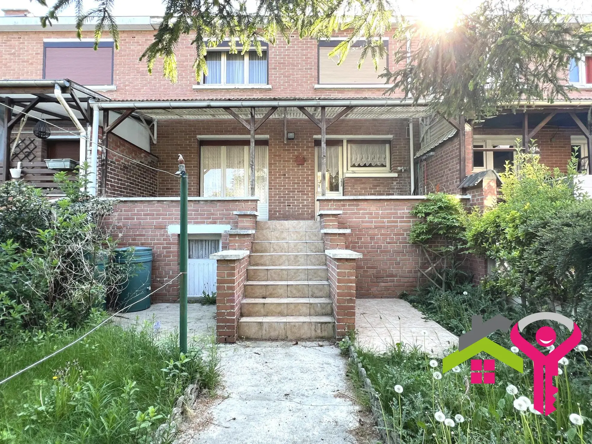 Maison lumineuse avec garage, jardin et terrasse à Denain 