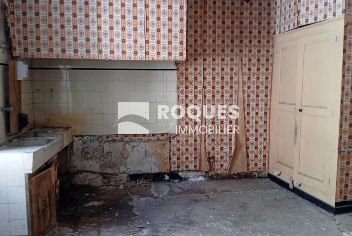Maison de ville à rénover à Millau - 100m² avec garage et jardin 