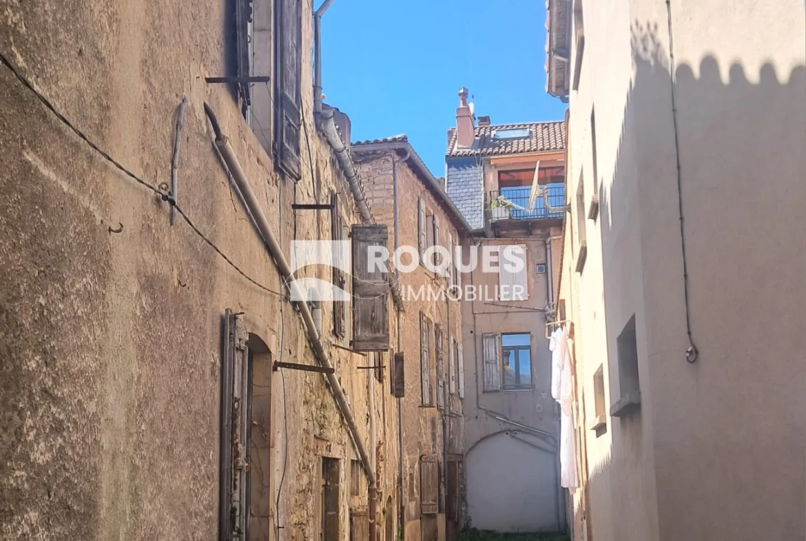 Maison de ville à rénover à Millau - 100m² avec garage et jardin 